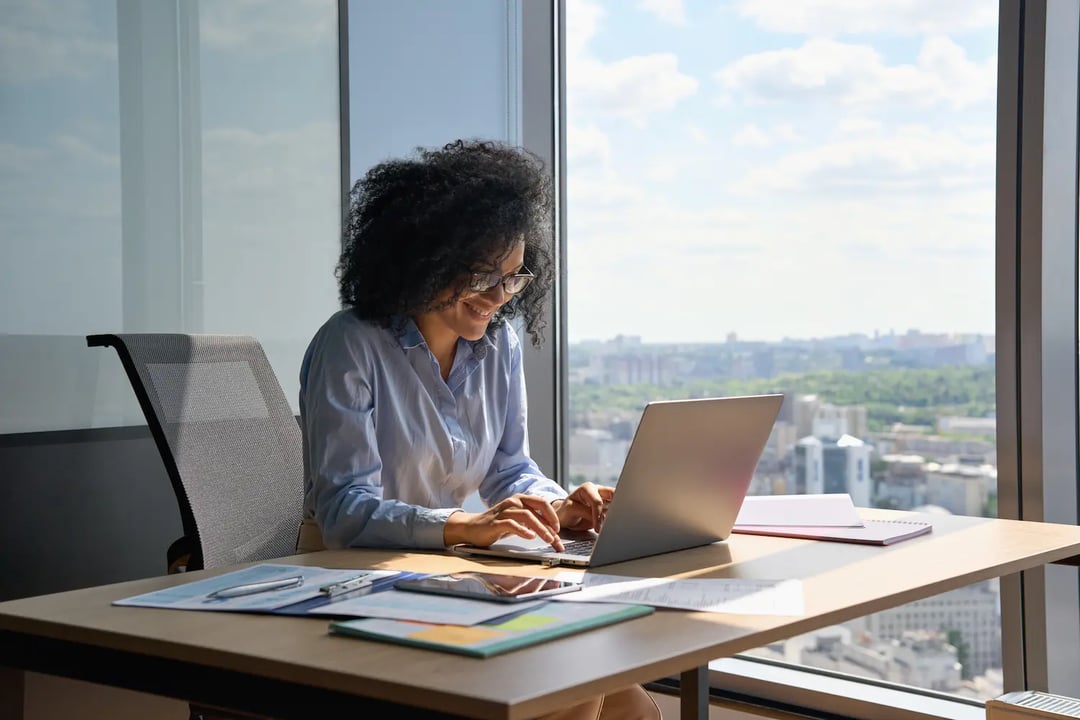 businesswoman executive-manager-sitting-at-desk