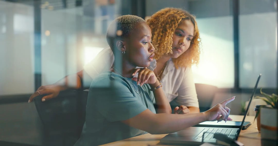 women looking at screen