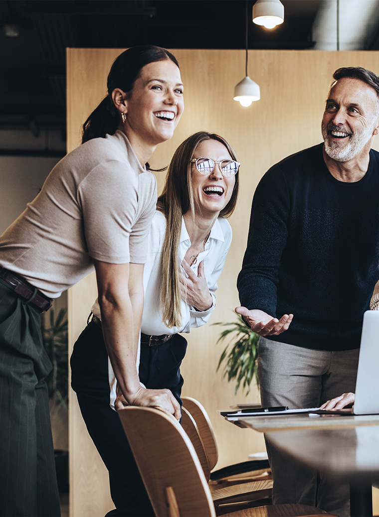 People laughing in an office